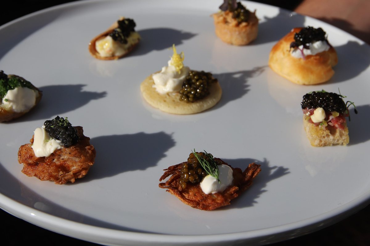A plate of caviar canapés by JAMM Private Dining